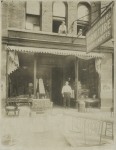 Nathan in front of his store